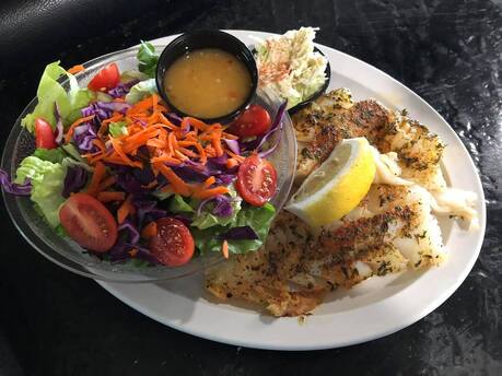 Baked Fish with Salad and Coleslaw in Depew, New York