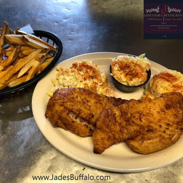 Fish Fry with Fresh Cut Fries, Macaroni Salad, Cole Slaw, Potato Salad, on plate at Jades Bar Restaurant in Depew, New York 14043