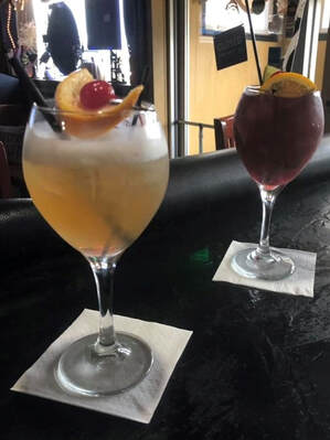 Jade’s Amaretto Sour and Homemade Sangria on Bar in Depew, New York