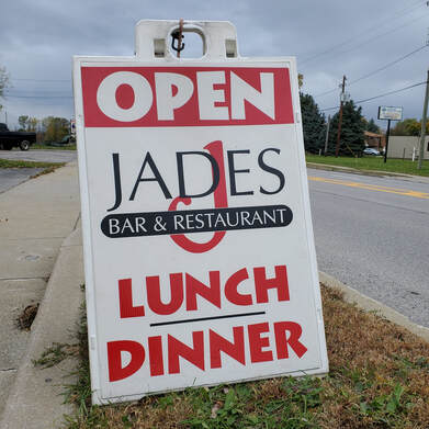jades bar restaurant street sign on broadway in depew new york